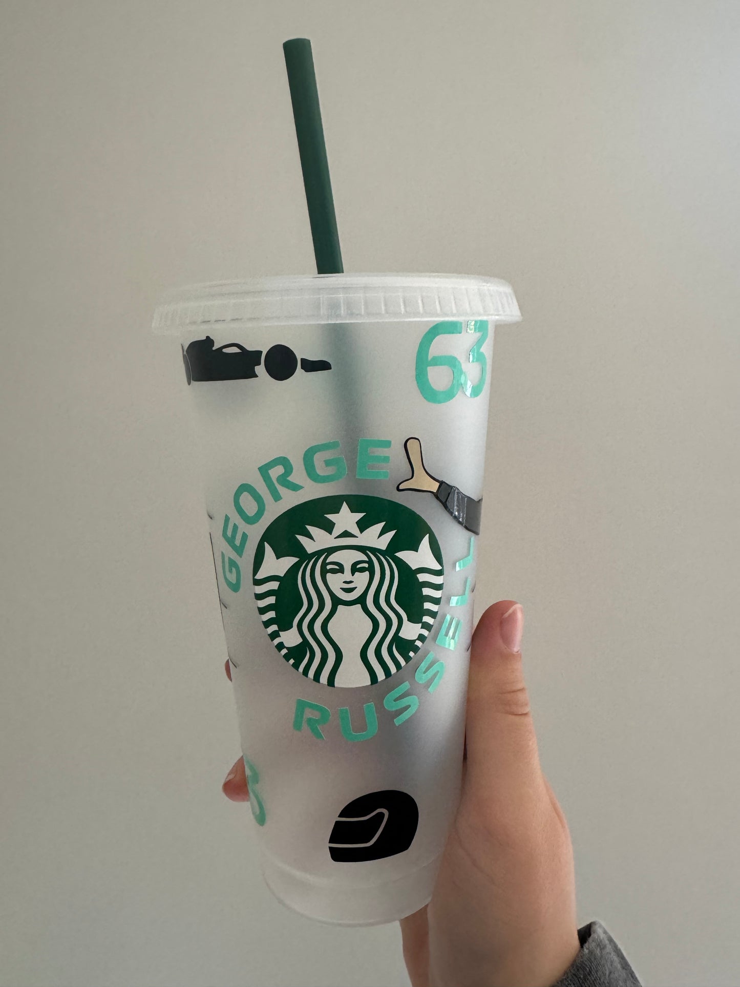 George Russell pose inspired Starbucks tumbler